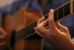 Learn Barre Chords by Playing Songs