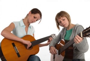 Learn Guitar by Learning Easy Songs