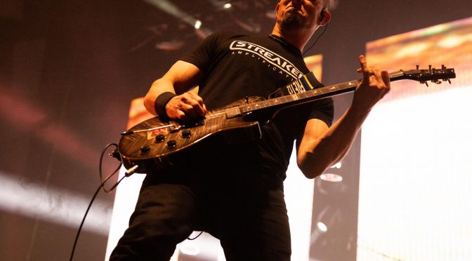 Mark Tremonti gifts his guitar to a stunned fan in an emotional onstage moment