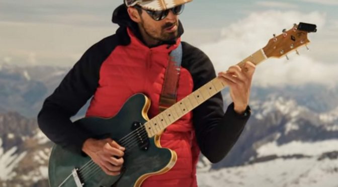 Guitarist climbs 3,200m up mountain to play sustainably-made guitar in support of conservation